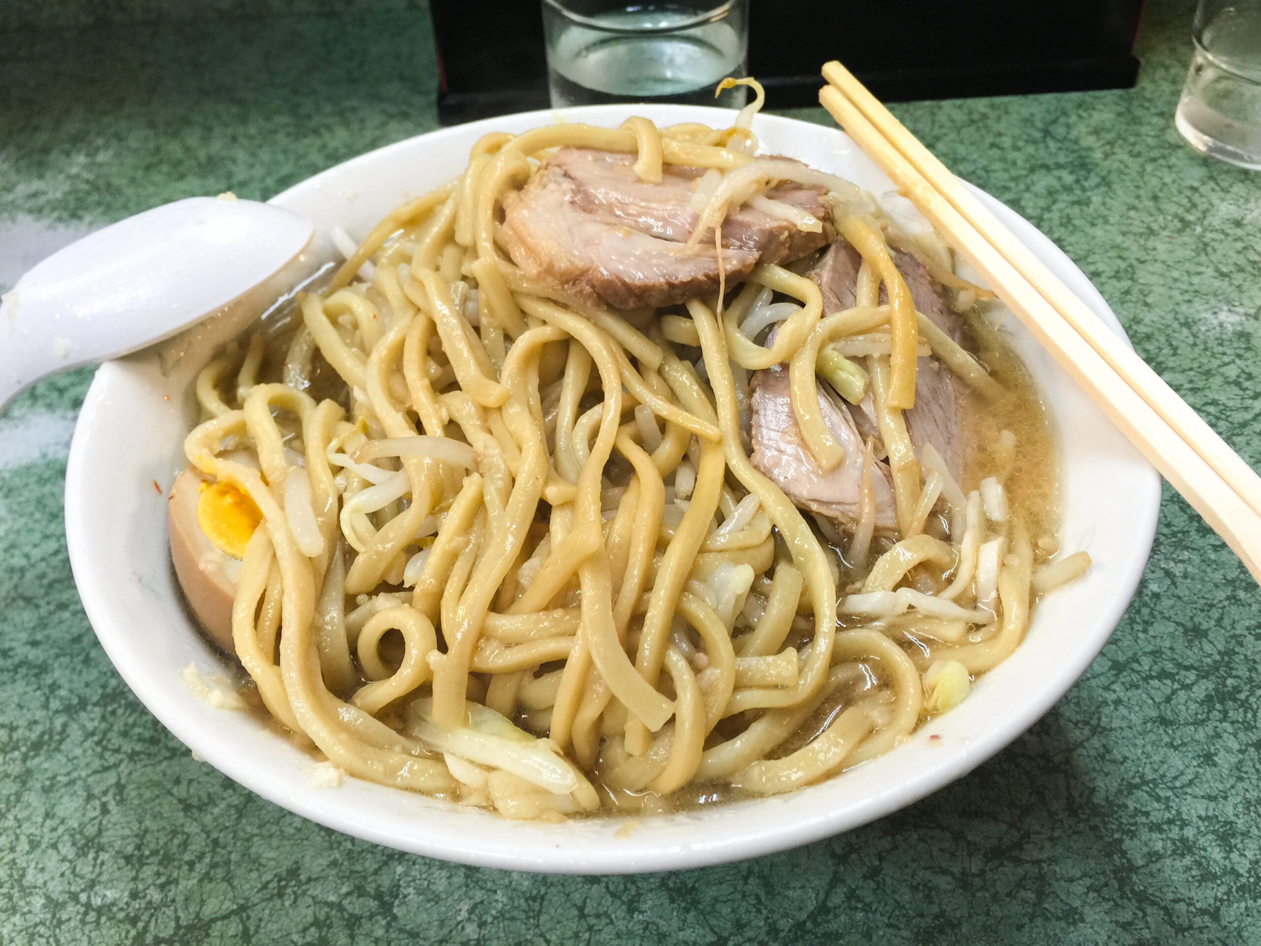 Bring noodles to the top to drench the otherwise bland vegetables in tasty broth.