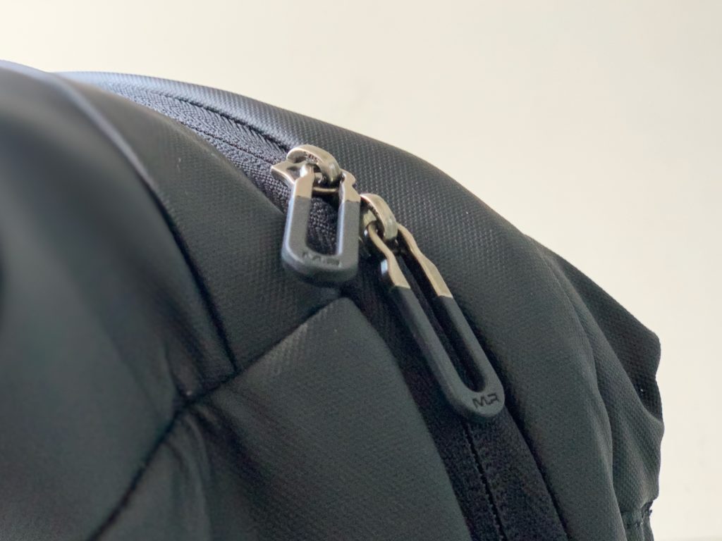 YKK zippers is replaced by SBS zippers to make this the perfect cheap backpack for travel.