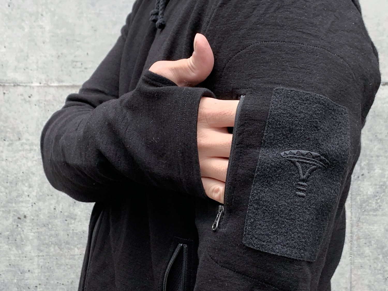 A black hoodie with more than enough pockets.