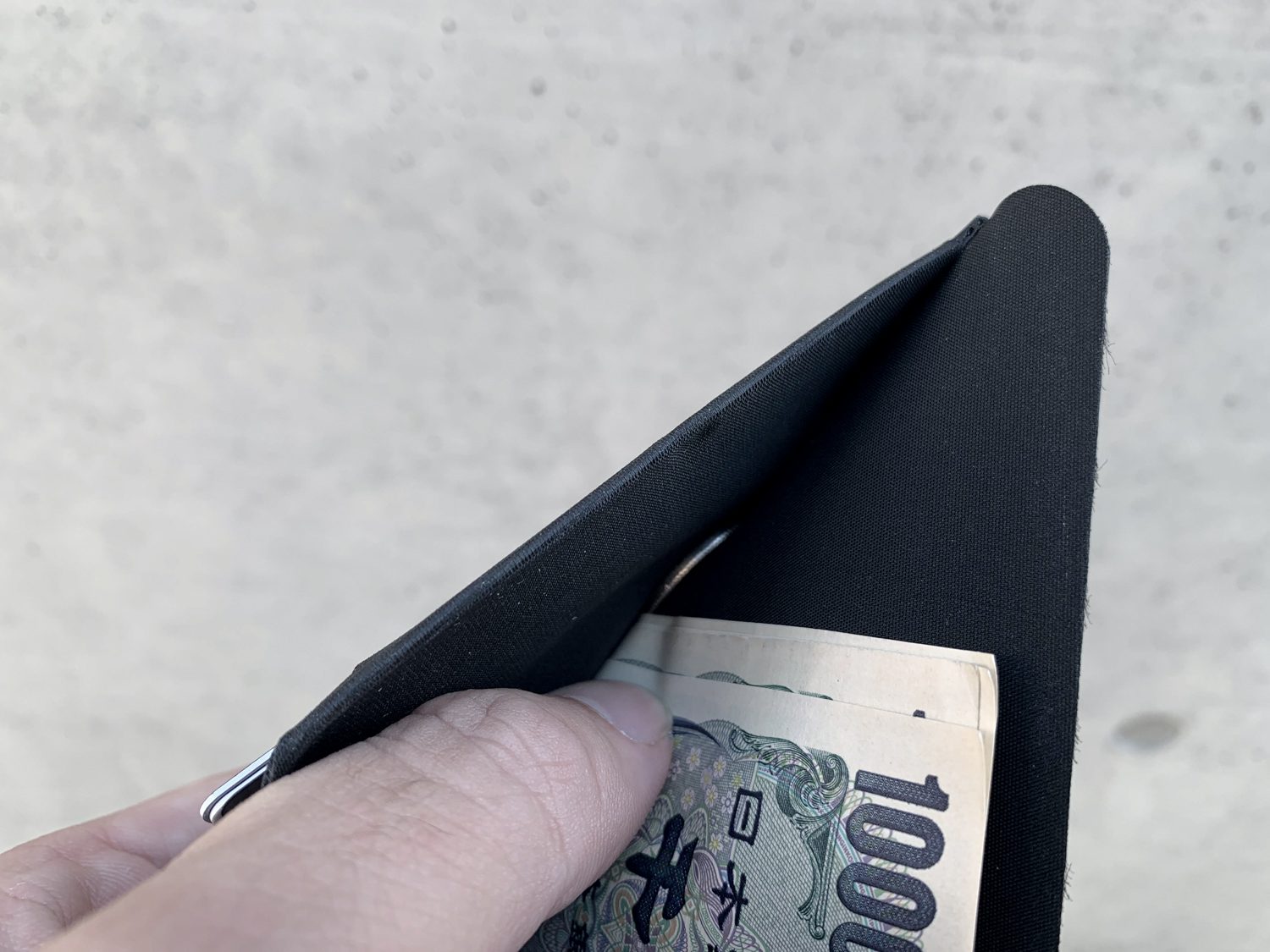 A bifold wallet means no coins compartment.