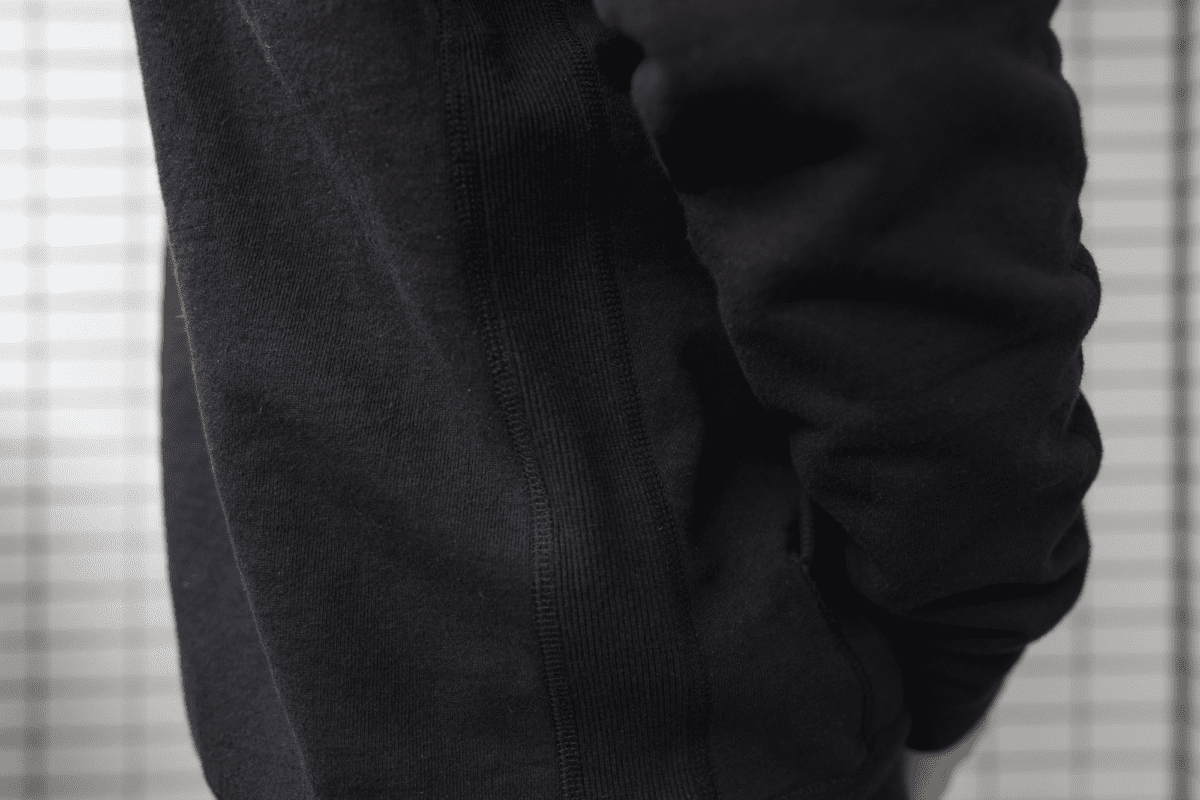 Side rib panels on the Reigning Champ Full Zip Hoodie that offer better freedom of movement