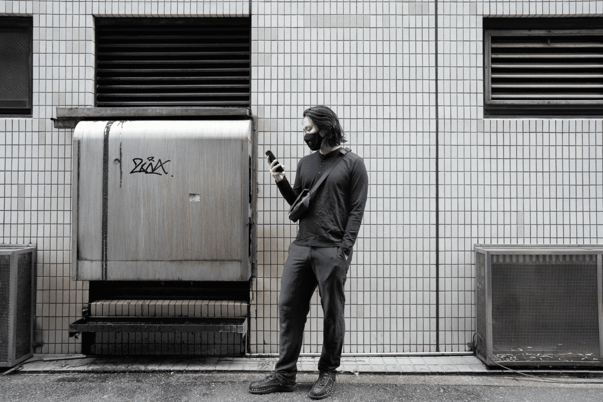 With the Airinum Mask, Wool&Prince Henley, Outlier Injected Linen Pants, MODERN DAYFARER DAYFARER Active Sling, and KEEN UNEEK Sandal.