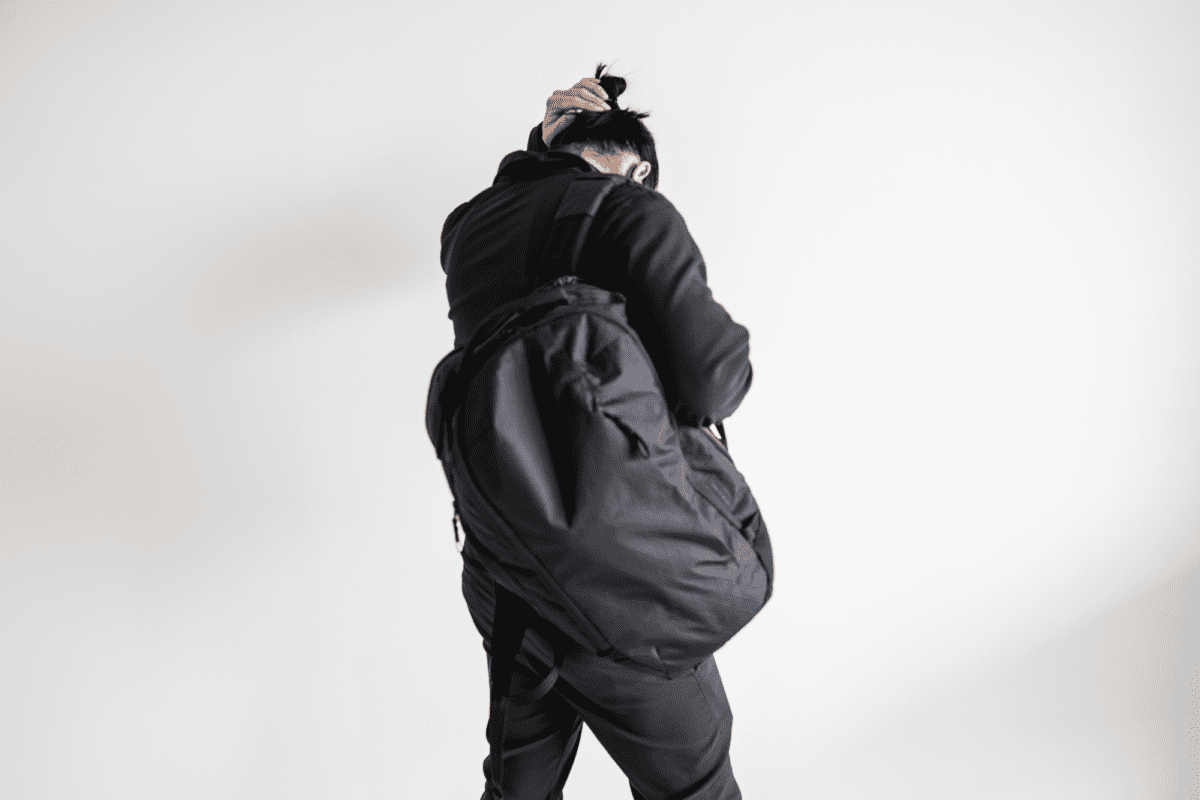 With the Outlier Hard Shirt, Outlier Futuredarts, and Able Carry Max Backpack.