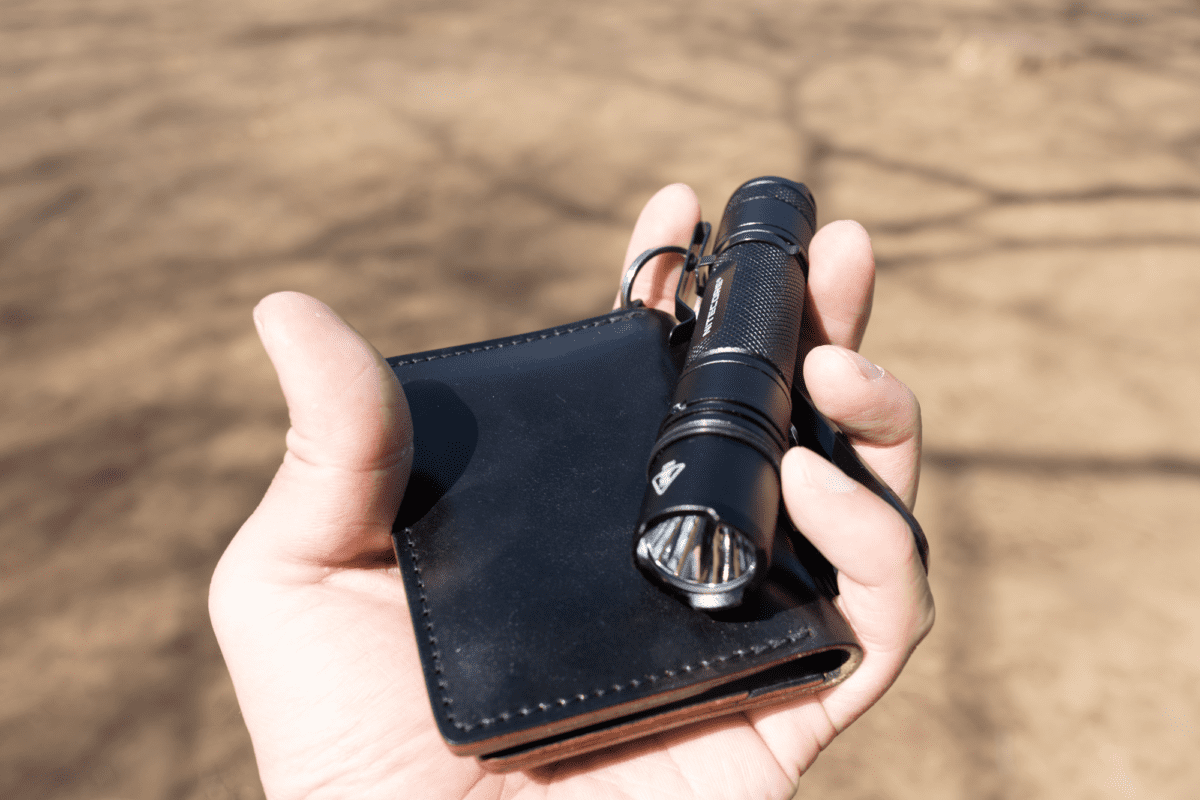 The Nitecore MH11 with the NOMAD Shell Cordovan Wallet.