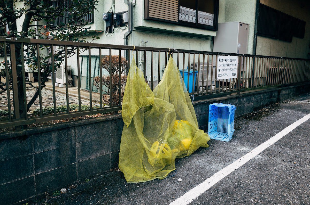 Nets to prevent crows from accessing garbage in Japan.