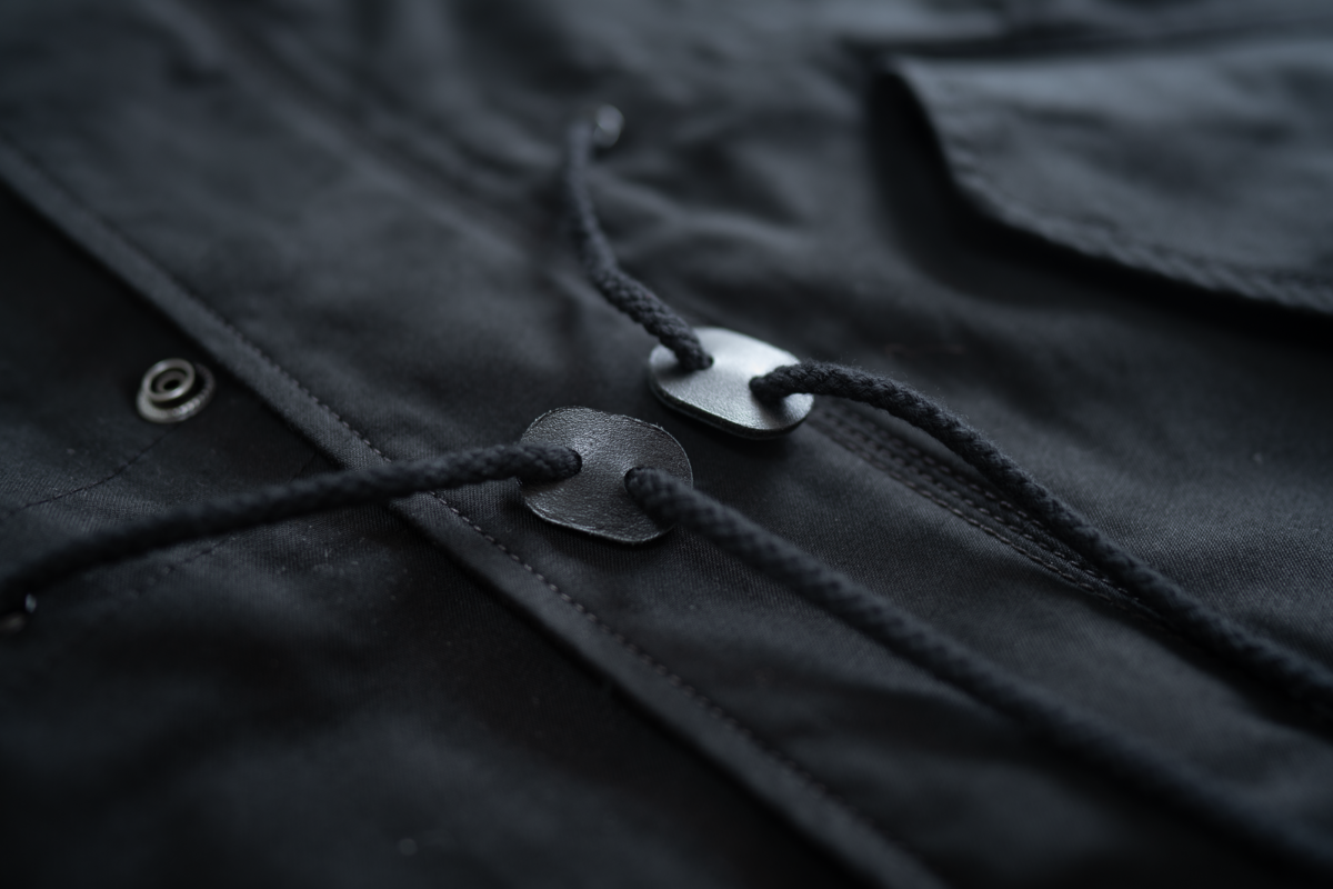 Tabs on the drawstring of the Alpha Industries M-59.